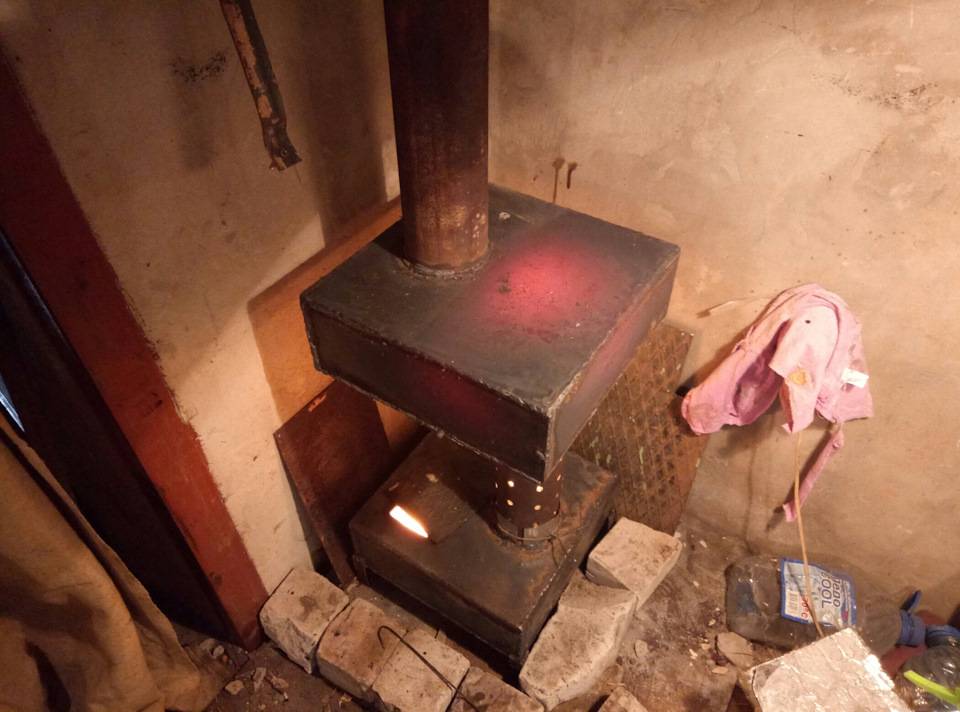 Как сделать кирпичную печь на дровах в гараж своими руками?