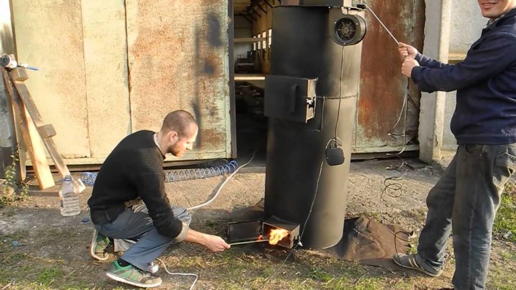 Как сделать дровяную печь длительного горения для отопления дома
