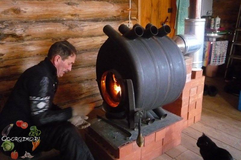 Печь длительного горения на дровах с водяным контуром